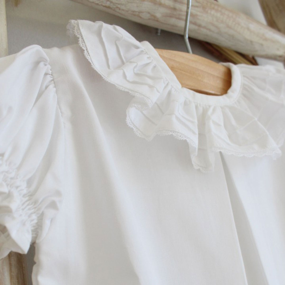 frilly white shirt
